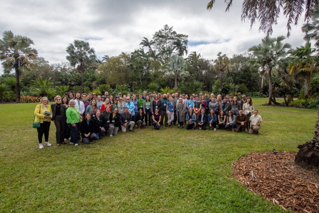 Wide shot of Forests in Cities members on lawn in Fairchild Botanic Gardens in Miami