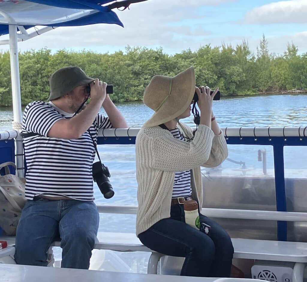 sam and emily on boat birdwatching