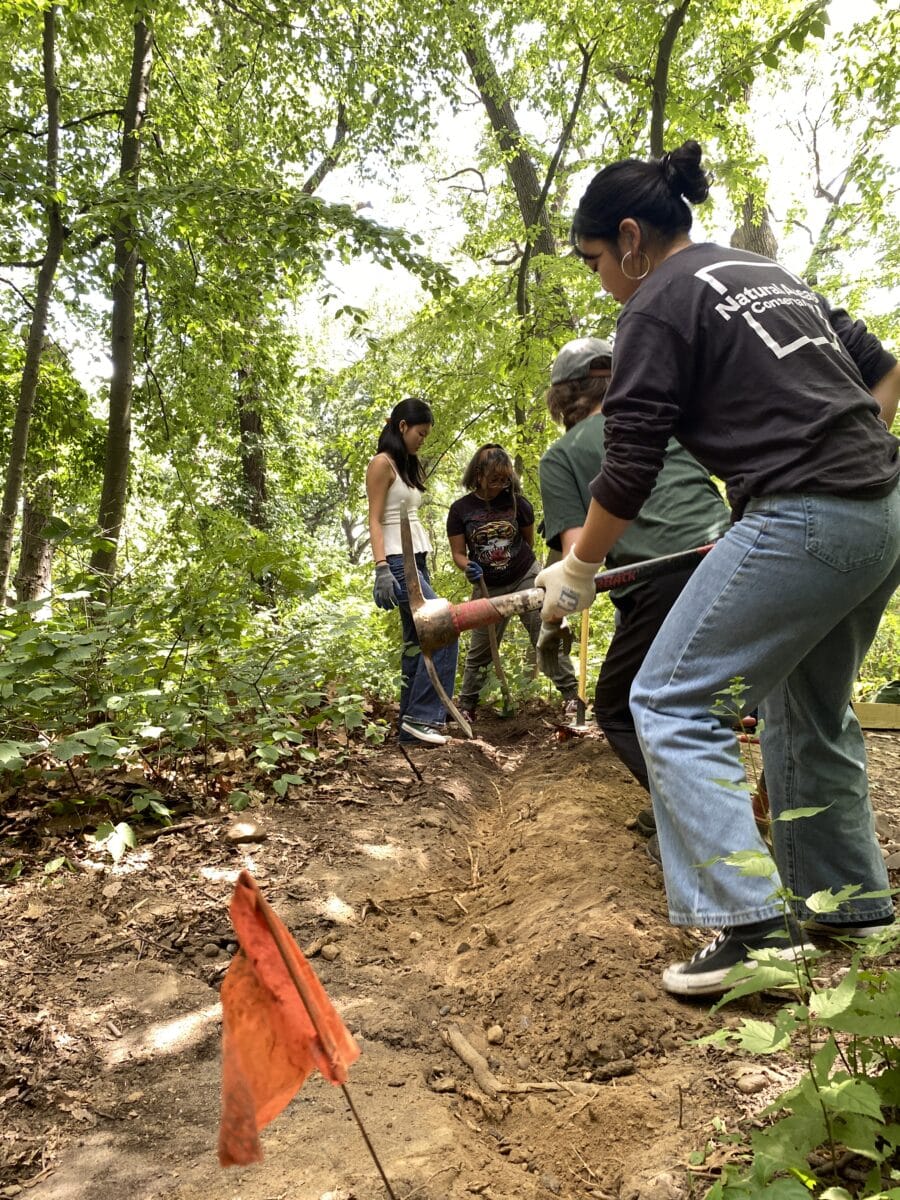 High School interns work on trails