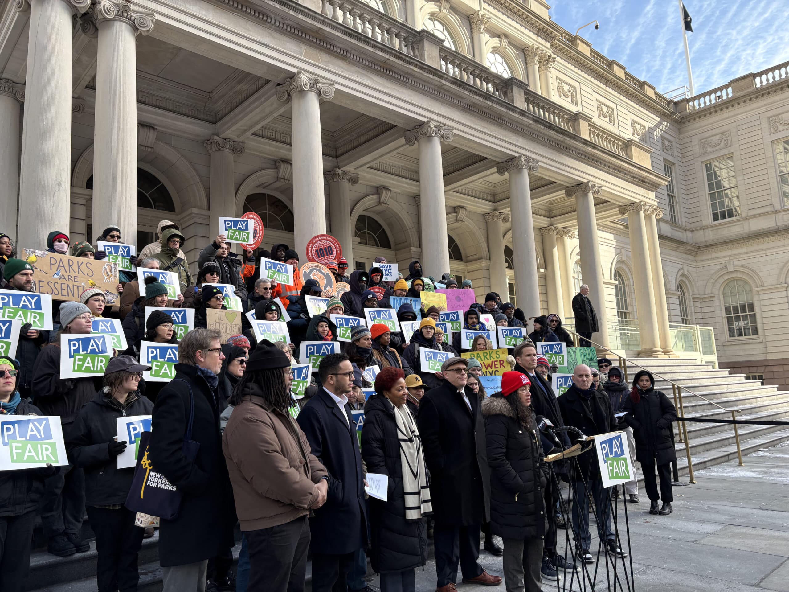 group of protesters outside cityhall