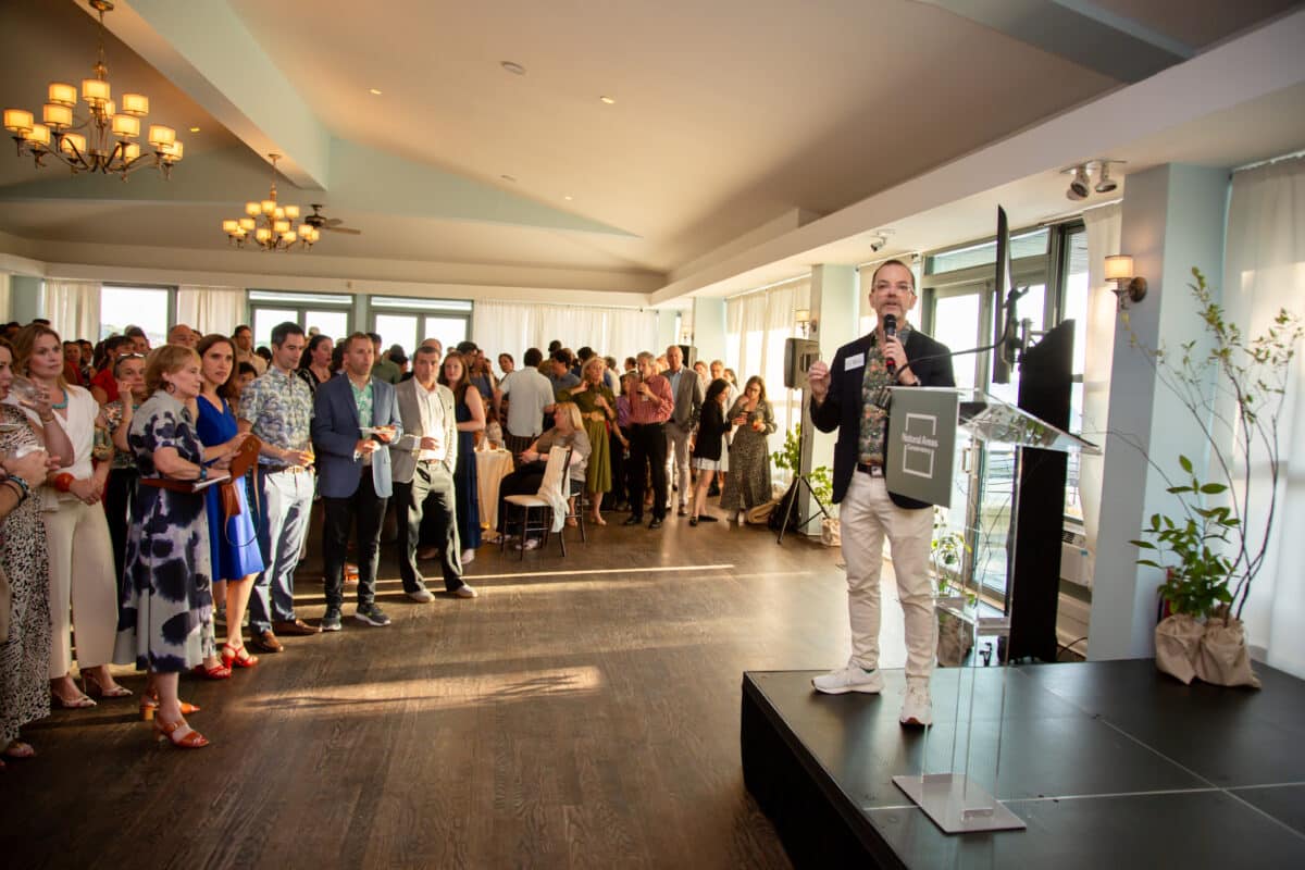 Image of NAC Board Member Jon Paul Buchmeyer speaking to Night for Nature attendees